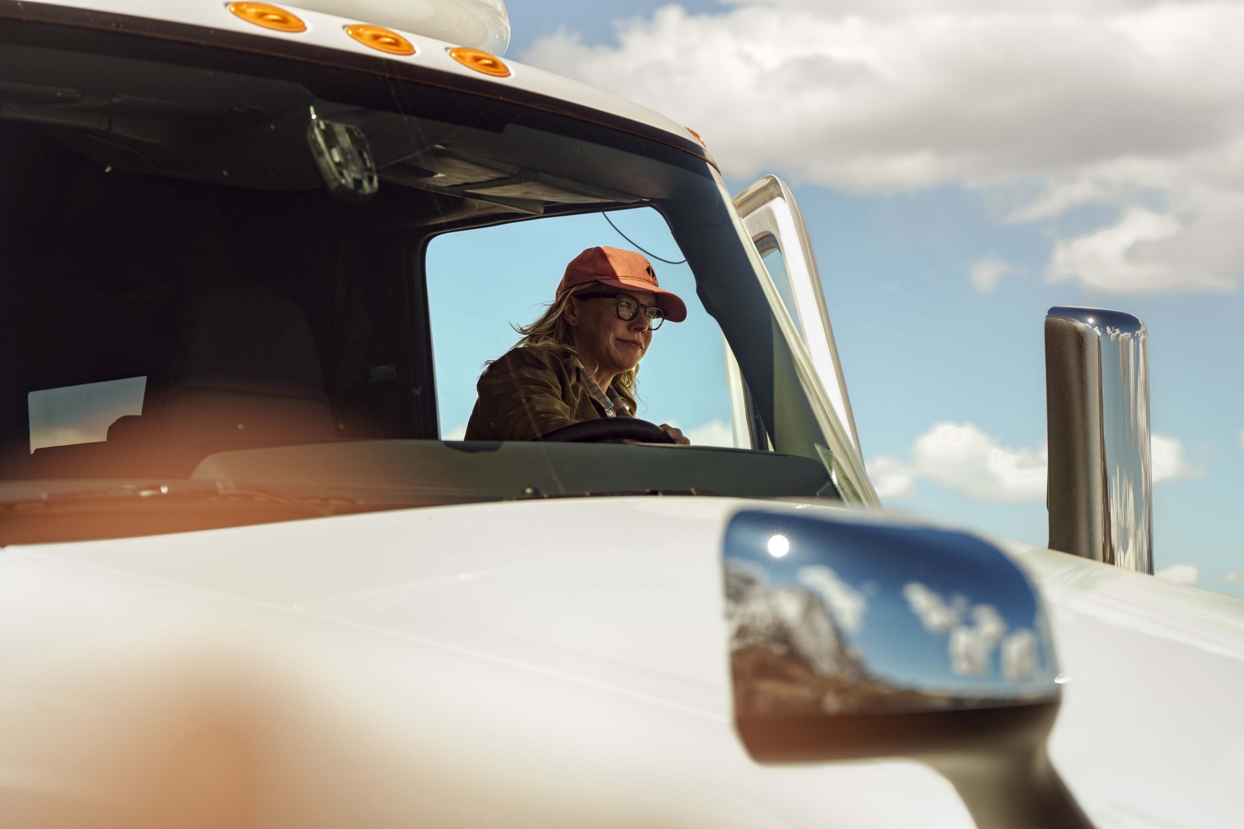 international-LT-foreground-cab-female-driver-boarding-240318-5839