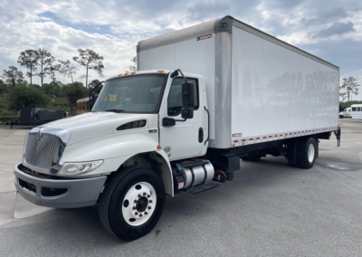 Drivers side view of box - 2020 International MV 26-foot box truck available now for $38,500.